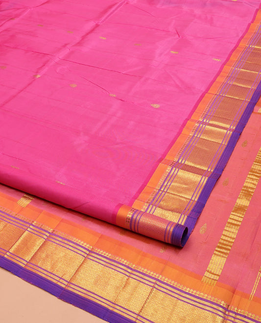 Pink Kanchipuram Silk Saree, Accentuated with Zari Buttas on Its Body, Complemented by a Contrast One-Sided Border of Panner Sombu, Banaras, and Mayil Kann Designs, Pallu of Zari Designs, and Comes Without a Blouse