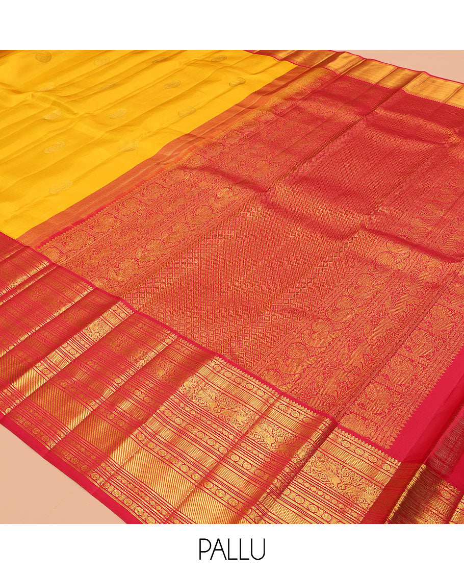 Yellow Kanchipuram Silk Saree, Embellished with Manga Buttas, a Contrast Korvai Border of Thilakam Mokku, Chakram, Then Kuli Kann, Kuthirai, and Poun Designs, Jaal Pallu, and a Contrast Blouse
