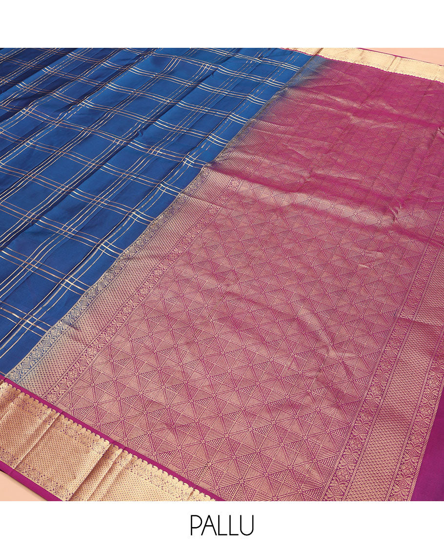 Blue Kanchipuram Silk Saree, Ornamented with Zari Checked Design on Its Body, Complemented by a Contrast Border of Manga, Rekku, Cross Kamalam, and Mayil Kann Designs, Grand Jaal Pallu, and Paired with a Contrast Blouse
