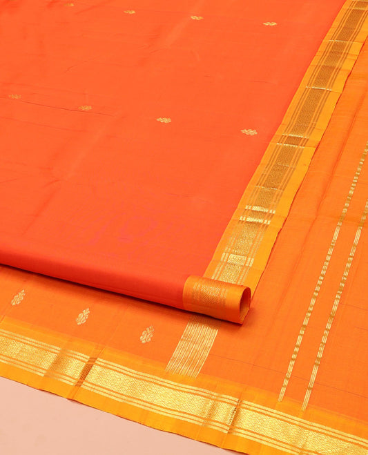 Orange Kanchipuram Silk Saree, Detailed with Zari Buttas on Its Body, Complemented by a Contrast One-Sided Border of Banaras, and Jaal Designs, Pallu Features Zari Designs, and Comes Without a Blouse