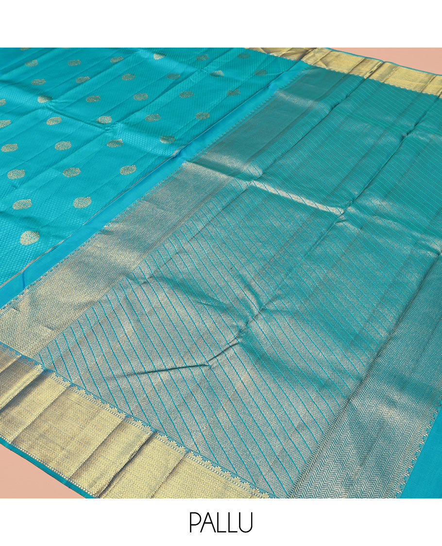 Blue Parampara Silk Saree, Adorned with Zari Buttas and Embossed Texture On Its Body, Highlighted by Zari Border of Thazampoo Rekku, Muthu, and Vanki Designs, Pallu Features Vanki Designs and Paired with a Matching Blouse