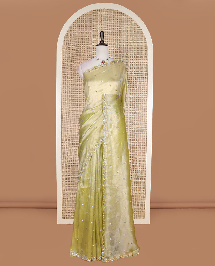 Green kardana and stone embroidered designer saree, scallop kardana and stone embroidered border