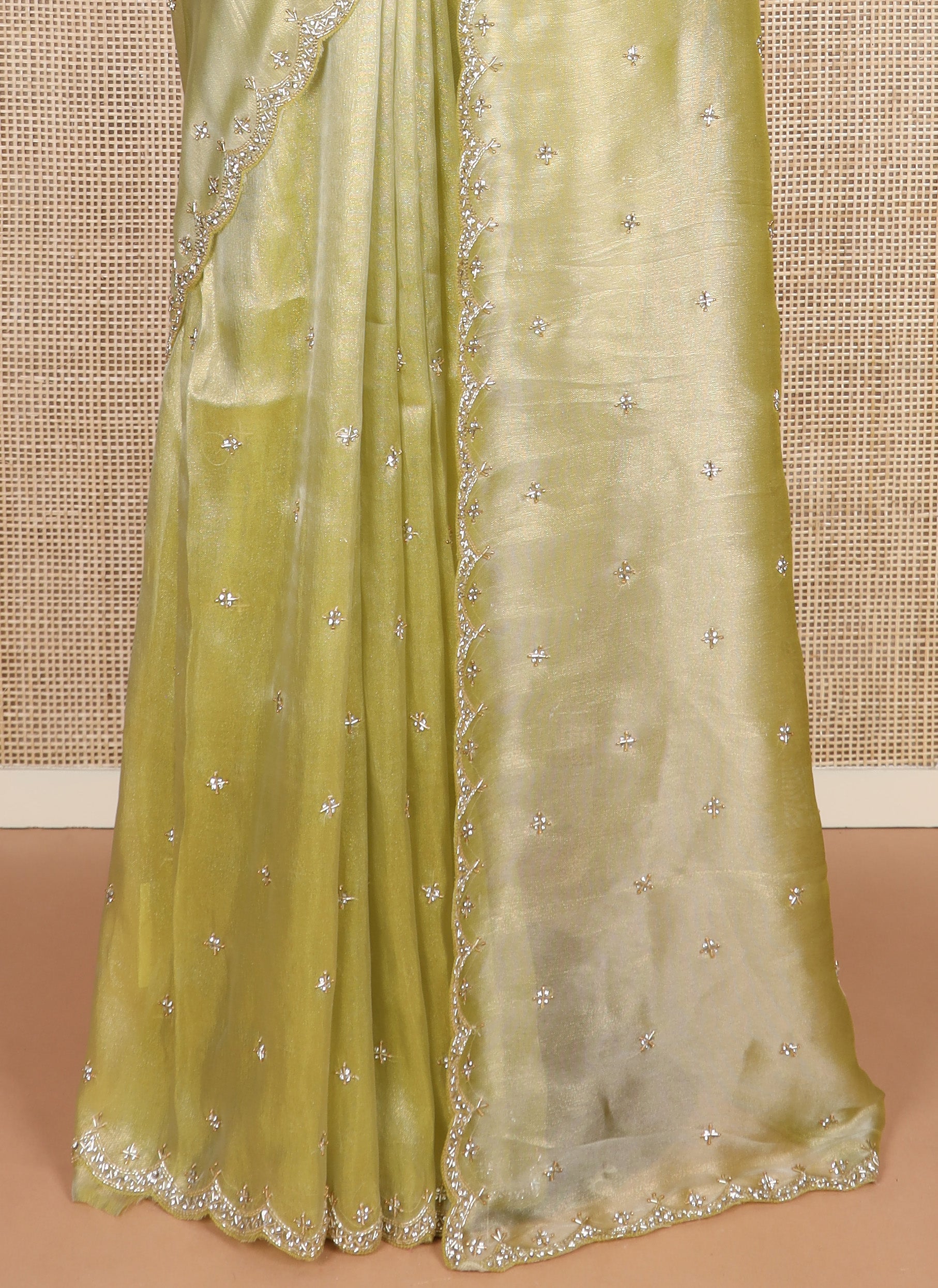 Green kardana and stone embroidered designer saree, scallop kardana and stone embroidered border