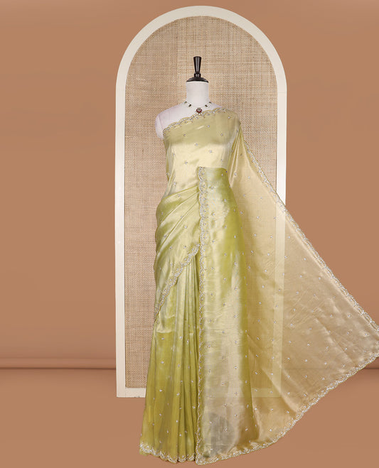 Green kardana and stone embroidered designer saree, scallop kardana and stone embroidered border