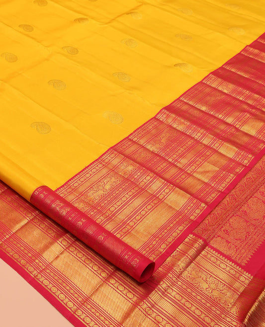 Yellow Kanchipuram Silk Saree, Embellished with Manga Buttas, a Contrast Korvai Border of Thilakam Mokku, Chakram, Then Kuli Kann, Kuthirai, and Poun Designs, Jaal Pallu, and a Contrast Blouse