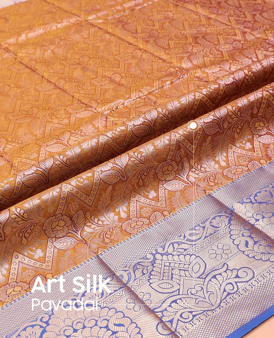 Mustard Art Silk Pavadai Material Set Majestically Detailed with Jacquard Design on Its Skirt, Complemented by a Contrast Zari Design Border, and Paired with a Matching Jacquard Blouse