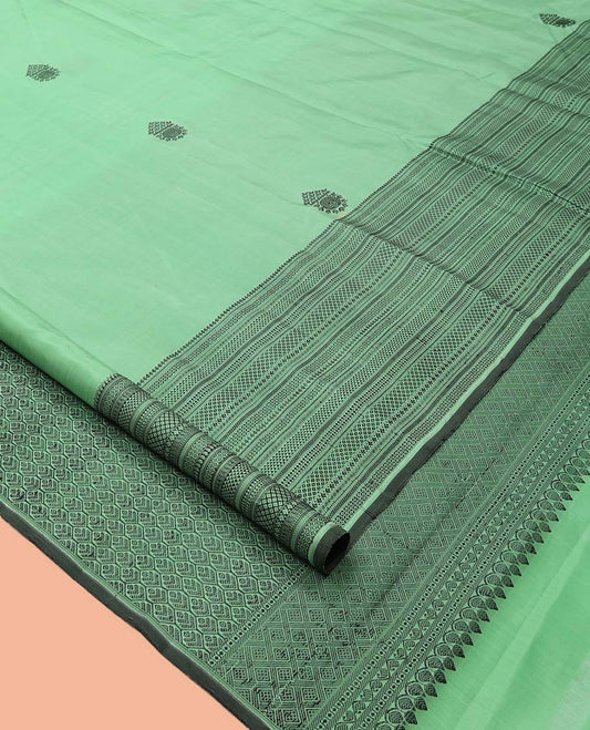 Pista Green Kanchipuram Silk Saree, Woven with Thread Buttas, a Self-Border of Manga, Ara Maadam, Kathir, Mayil Kann, Jaal Pallu, and a Matching Blouse