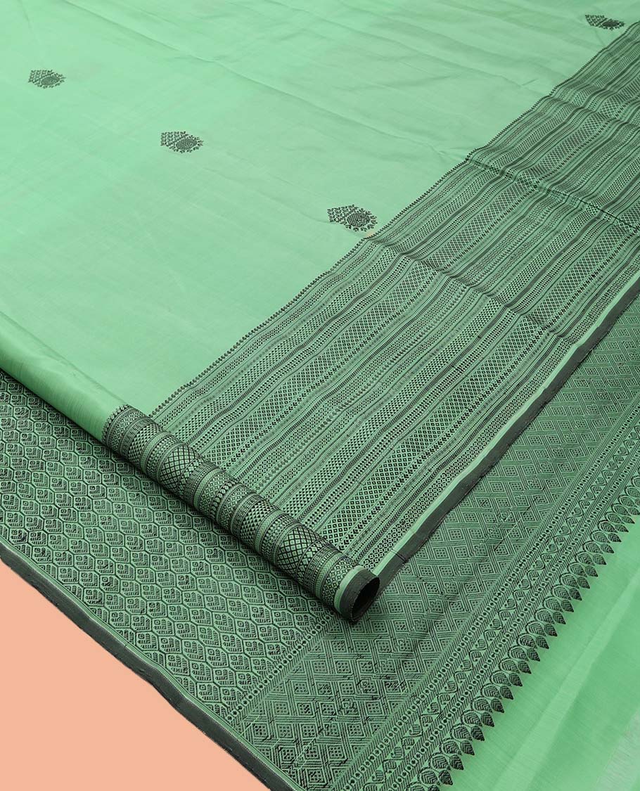 Pista Green Kanchipuram Silk Saree, Woven with Thread Buttas, a Self-Border of Manga, Ara Maadam, Kathir, Mayil Kann, Jaal Pallu, and a Matching Blouse