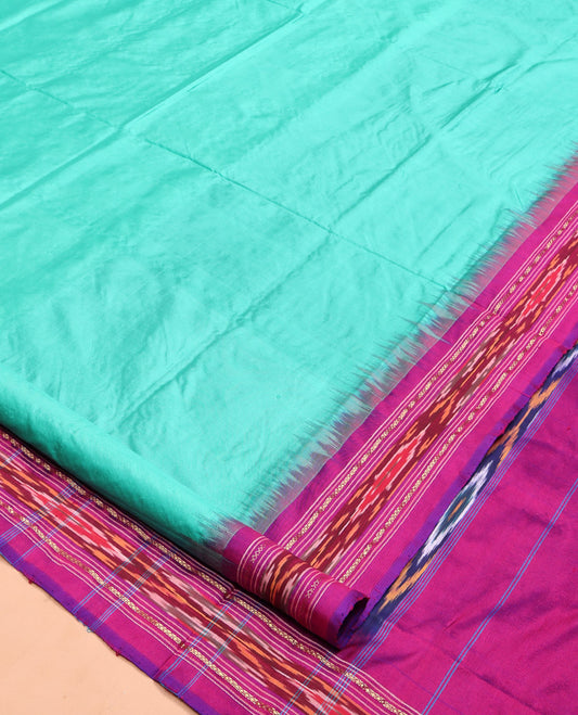 Blue Plain Pochampally Ikat Silk Saree, Complemented by a Contrast Temple Ikat Border, Ikat-Style Pallu, and No Blouse
