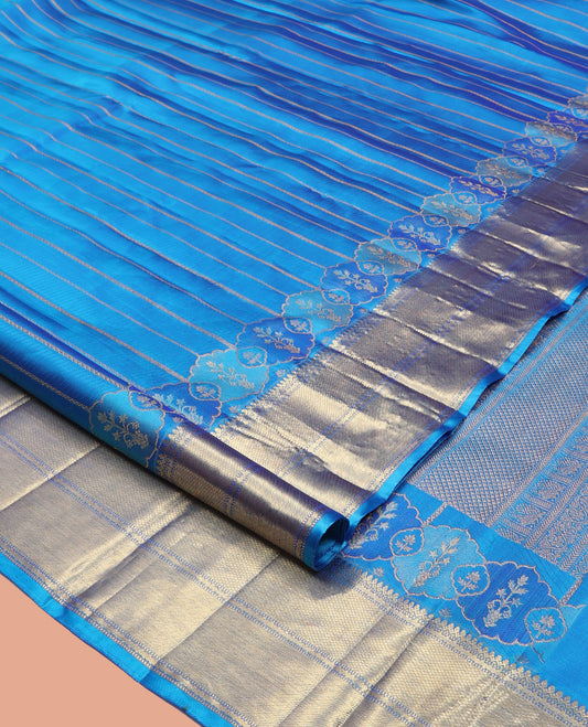 Blue Kanchipuram Designer Silk Saree, Gleamed Up with Zari Stripes, a Zari Border of Thilakam Mokku, Muthu, Rettai Neli, and Kuyil Kann Designs, Intricate Pallu, and a Matching Blouse