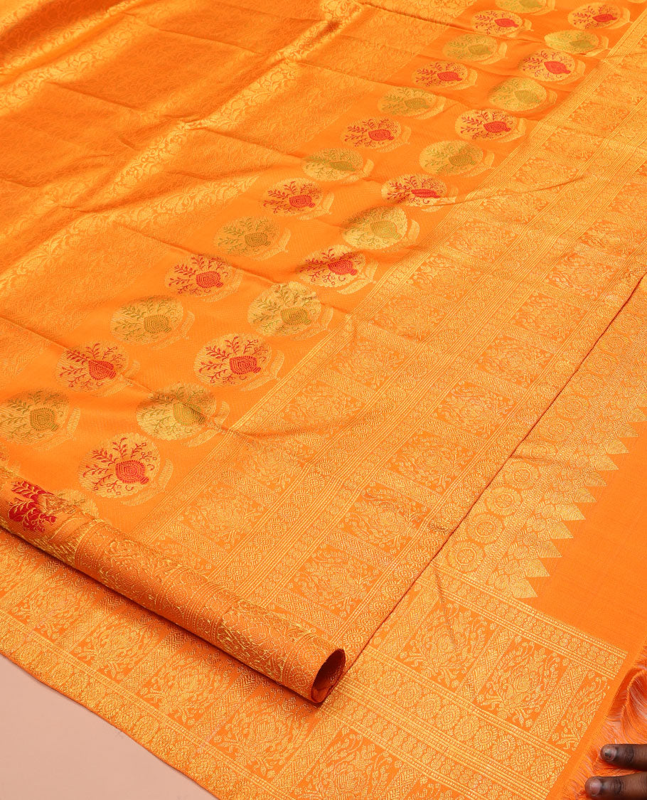 Orange Kanchipuram Designer Silk Saree, Subtly Sparkled With Floral Jacquard Design On Its Body, Highlighted by Meenakari Mughal Intricate Border, Intricate Pallu and Paired with a Matching Blouse