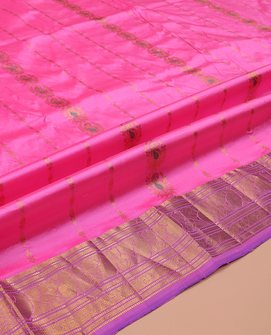 Pink Pure Silk Half-Saree, Spotlighted with Zari Designs on Its Body, Complemented by a Contrast Traditional Zari Design Border, Complemented by a Contrast Blouse, and Paired with a Contrast Dhavani of Ogee Designs