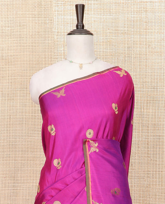 Rani Pink Gadwal Saree Zari Embellished with Peacock Chakram Buttas, Subtle Piping Border, Pallu of Bird Buttas, and a Contrast Blouse of Zari Buttas