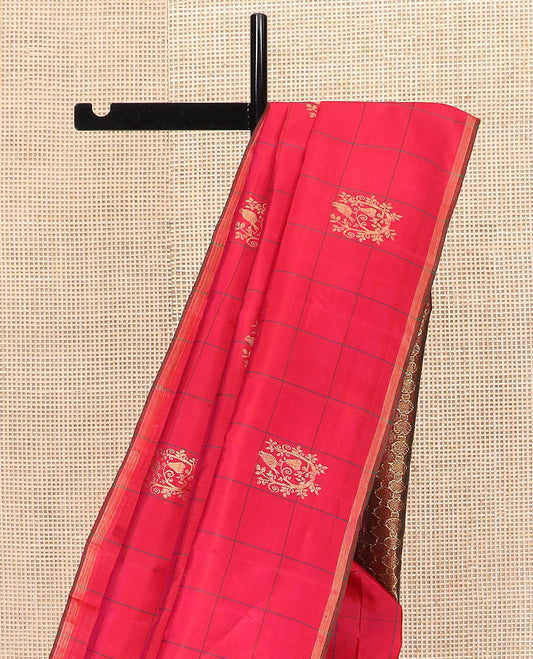 Borderless Red Kanchipuram Silk Saree Subtly Sparkled with Zari Buttas Enclosed Checks, Complemented by a Contrast Pallu of Rudraksham-Style Round Motifs, and Paired with a Contrast Blouse
