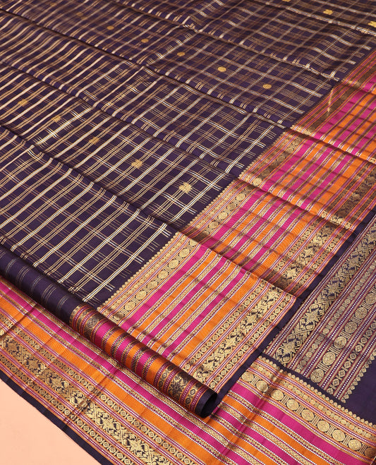 Violet Kanchipuram Designer Silk Saree Features Mayil-Chakra Checks, Contrast Border of Thilakam Mokku, Muthu, Poun, Chakram, Neli, and Mayil Kann, Geometric Pallu, and a Matching Blouse