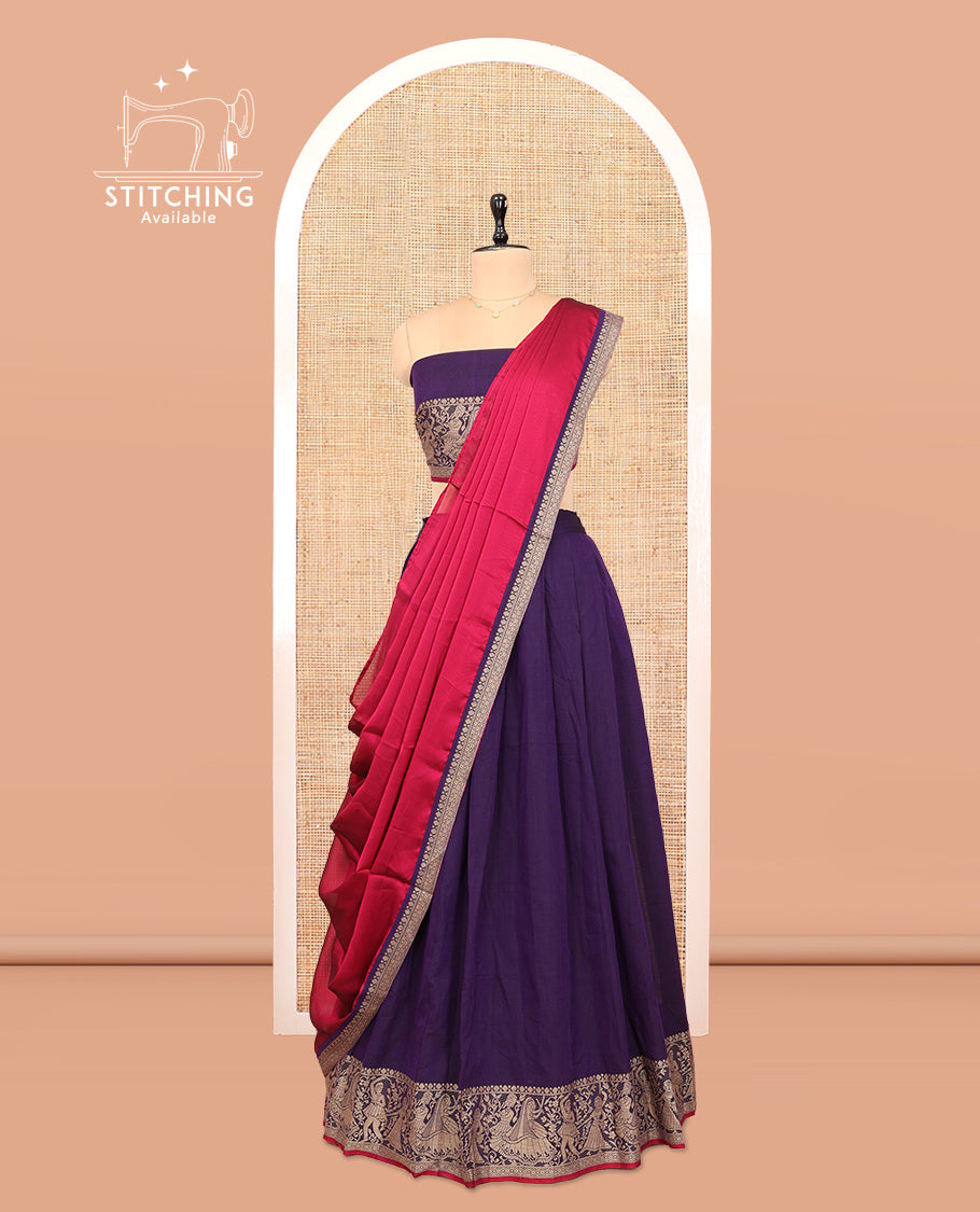 Violet Cotton Half-Saree Features Plain Skirt, a Contrast Dancing Human Figurines Border, a Matching Blouse, and a Contrast Dhavani