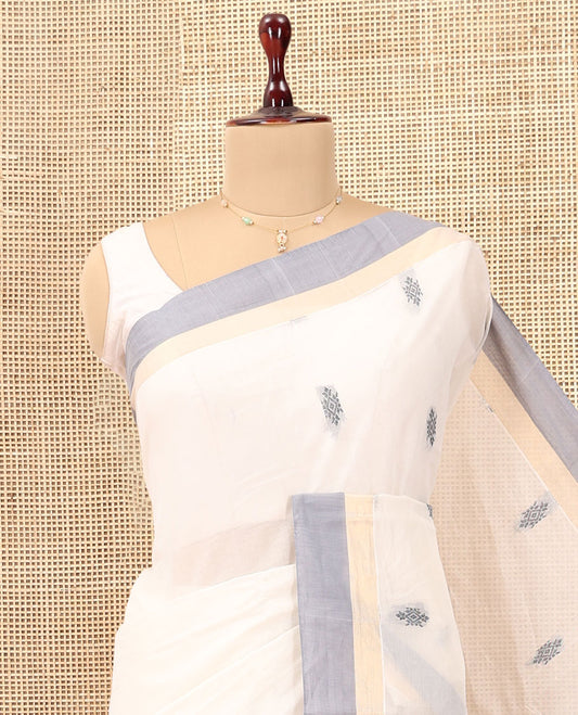 White Kanchi Cotton Saree, Woven with Thread Buttas, a Contrast Border, Intricate Pallu, and a Matching Blouse