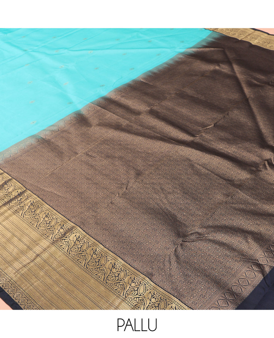Blue Vasundhara Lite Silk Mix Saree, Accentuated with Zari Buttas, a Contrast Border of Kathir, Mayil Kann, and Kodi Visiry Designs, Jaal Pallu, and a Contrast Blouse