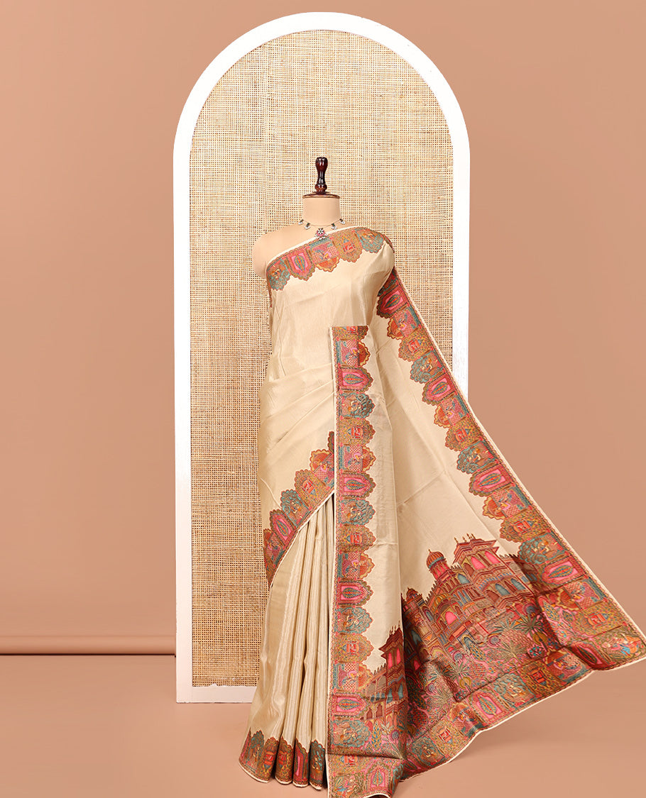 Cream Plain Dola Silk Saree, Complemented by Captivating Contrast Border of Meenakari-style Mughal Human Figurines, Pallu Artfully Pictures Mughal Human Figurines, and Paired with a Matching Blouse