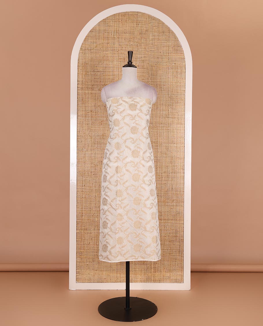 Cream with yellow semi-chanderi material churidar set, floral jaal jacquard top, contrast taffeta silk bottom, and jamdani style dupatta