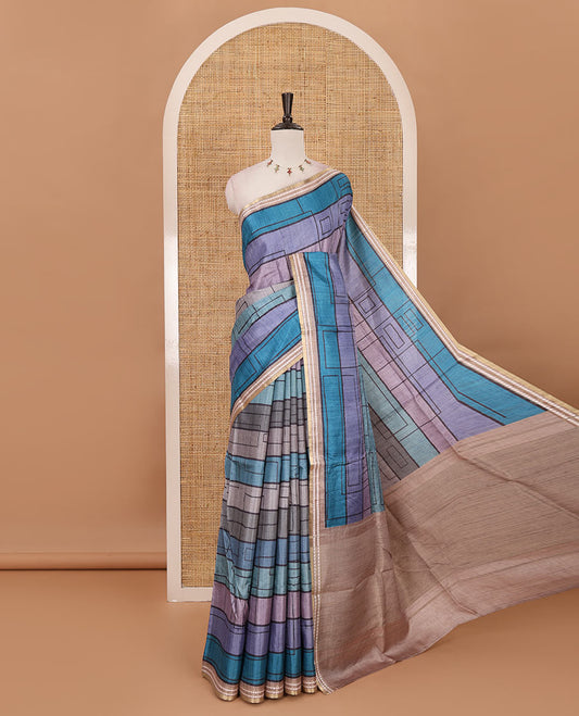 Blue abstract geometric printed semi-tussar saree, contrast thread triangle motifs border, striped pallu & contrast striped blouse