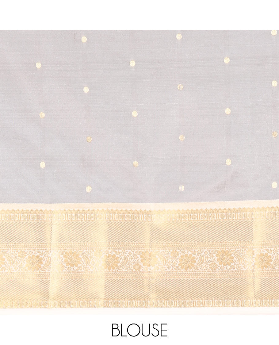 Red Soft Silk Saree Decked Up with Antique Zari Buttas, Complemented with a Contrast Traditional Zari Design Steeped Border, Adorned with Intricate Pallu, and a Contrast Blouse