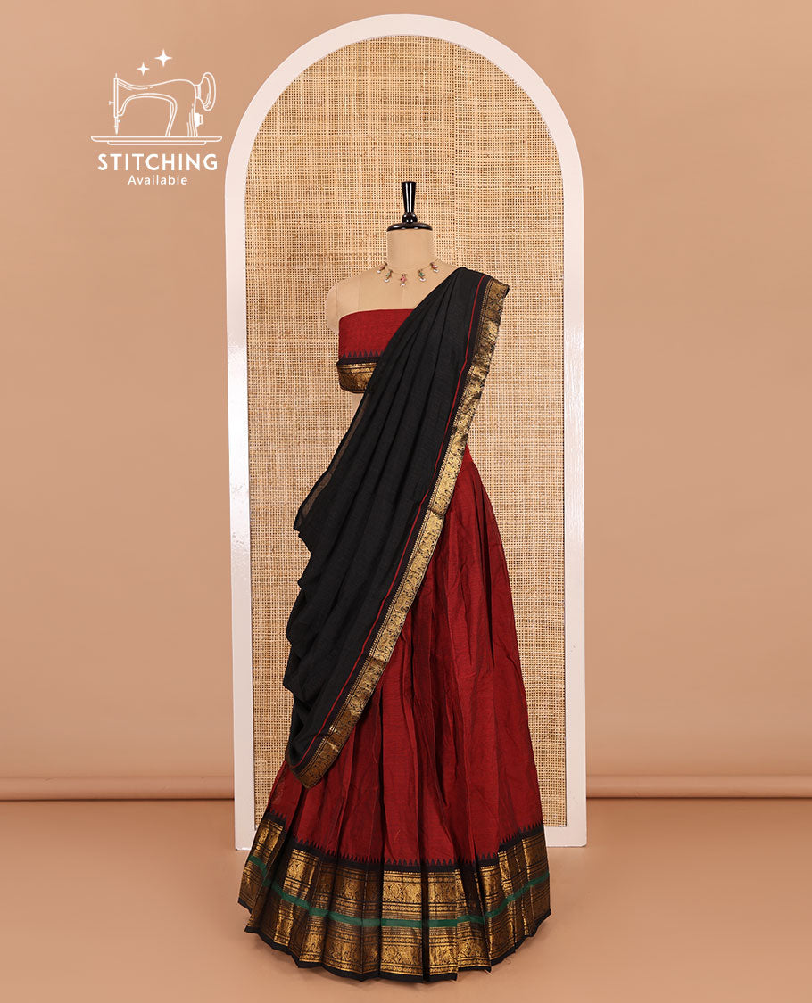Maroon-black sungudi cotton half-saree, plain with contrast traditional zari varisai pettu bordered skirt, a matching blouse, and a zari bordered dhavani