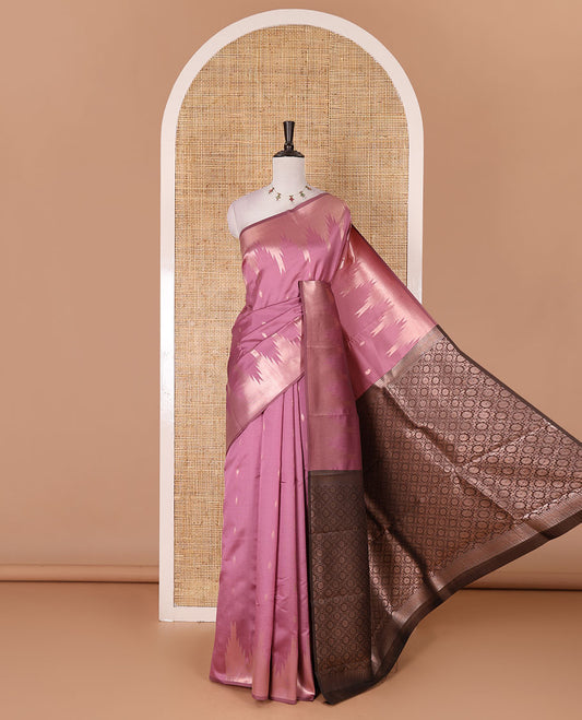 Pink zari buttas kanchi silk saree, temple zari border, zari-rich jaal pallu, and zari motifs woven blouse