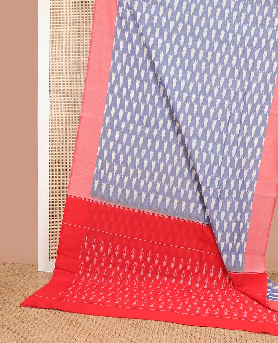 Powder blue geometric design ikkat cotton saree with contrast border & arrow motifs pallu
