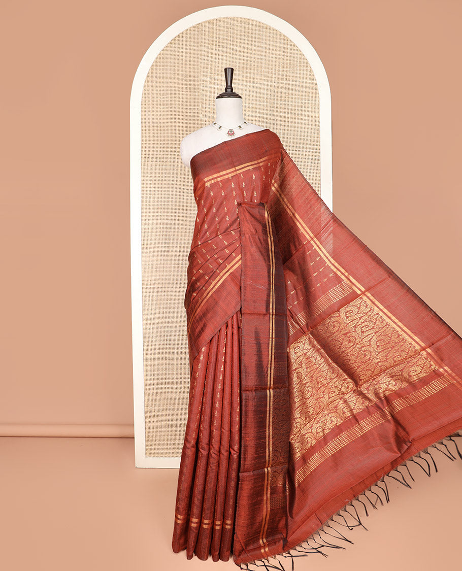 Rust Orange Dupion Silk Saree, Steeped with Zari Buttas All Over Its Body, Subtly Woven Zari Striped Border, Gleaming Pallu of Floral Vine Designs, and Paired with a Matching Blouse
