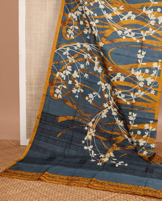 Grey with mustard floral design printed silk saree with contrast border & striped design pallu