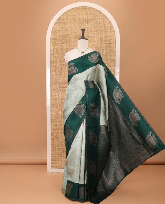 Pista green zari checked & elephant motifs woven kanchi silk saree, contrast korvai-style border of elephant motifs, intricate pallu & plain blouse