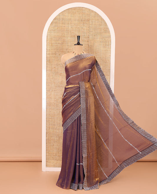 Copper horizontally swarovski stone striped fendi chiffon saree, swarovski stone work border, and a plain blouse