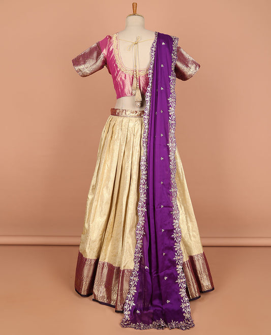 Cream jacquard semi-stitched half saree with contrast zari border,  embroidered blouse & scallop border dhavani