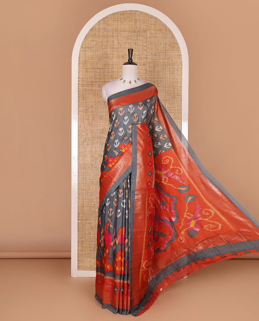 Grey pochampally style floral, and peacock printed dola silk saree, zari border, pallu of ikkat designs, and contrast ikkat motifs blouse