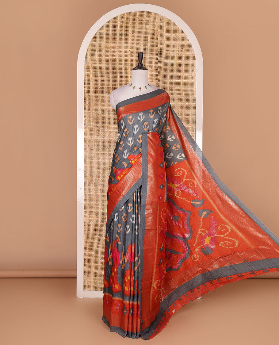 Grey pochampally style floral, and peacock printed dola silk saree, zari border, pallu of ikkat designs, and contrast ikkat motifs blouse