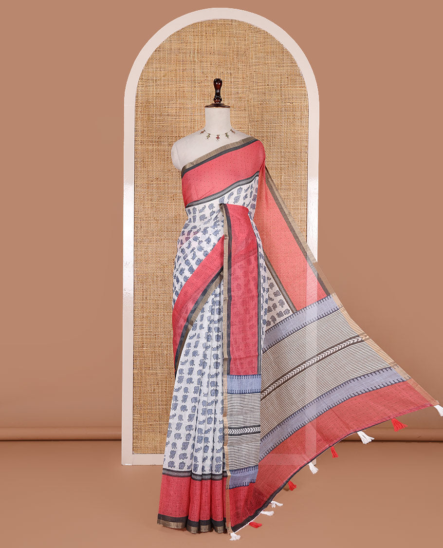 White cute elephant motifs printed linen cotton saree, contrast chevron border, pallu of stripes and chevron, and contrast printed blouse