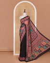 Black kaleidoscopic colored floral-geometric printed with mirrorwork masakali saree, printed border, print with mirror work pallu, and a matching blouse