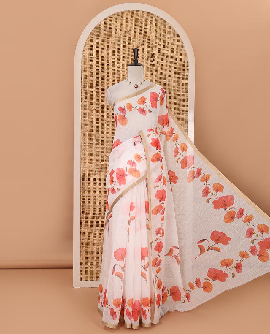 White-base orange color floral creeper printed linen saree, zari piping border, floral creeper print pallu & floral print blouse