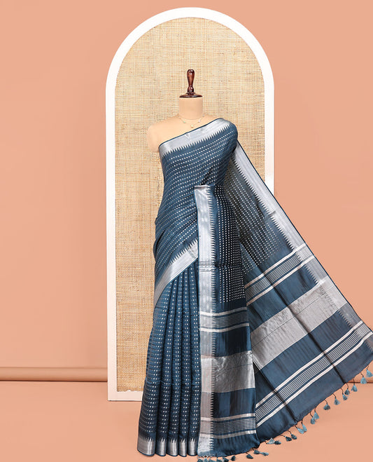Blue Banana Pith Saree, Steeped with Buttas All Over Its Body, Highlighted by Temple Zari Border, Pallu of Gleaming Zari Stripes, and Paired with a Matching Blouse