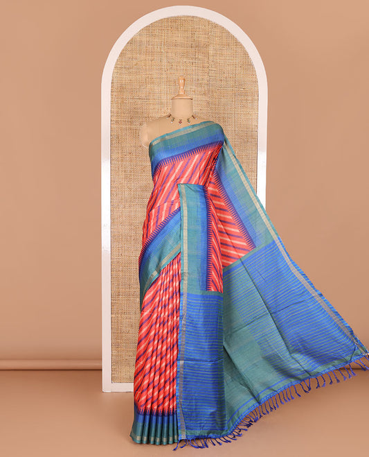 Tomato pink leheriya stripes printed katan silk saree, contrast zari piping temple border, temple pallu, and a contrast square buttas printed blouse
