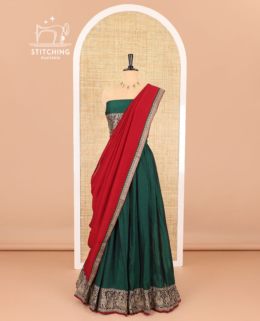Green half-saree, plain with contrast human dancing motifs woven bordered skirt, matching blouse , and a contrast thin bordered dhavani