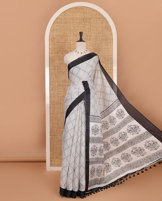 White-black diamond patterned khadi cotton saree, contrast plain border, intricate print pallu & contrast star motifs printed blouse