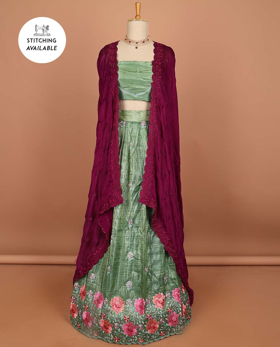 Green buttas half saree with contrast border , zari design blouse & floral buttas , scallop border dhavani