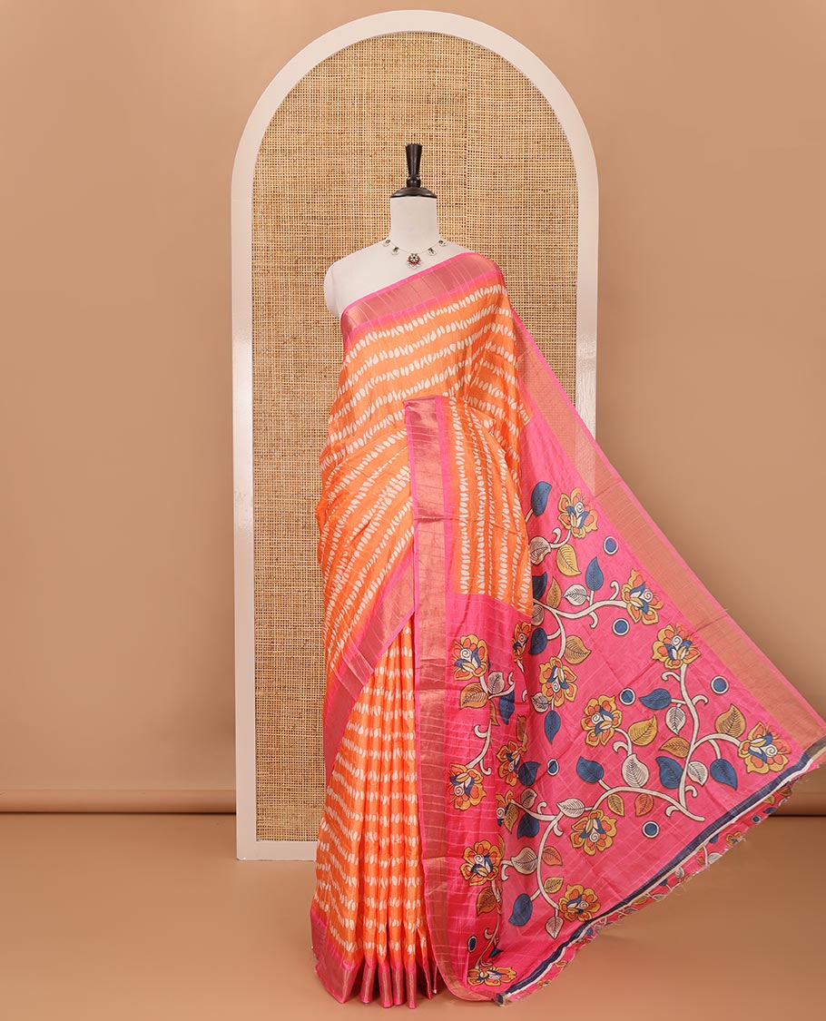 Orange uniquely printed soft tussar saree, contrast zari border, kalamkari floral vine printed pallu & kalamkari printed blouse