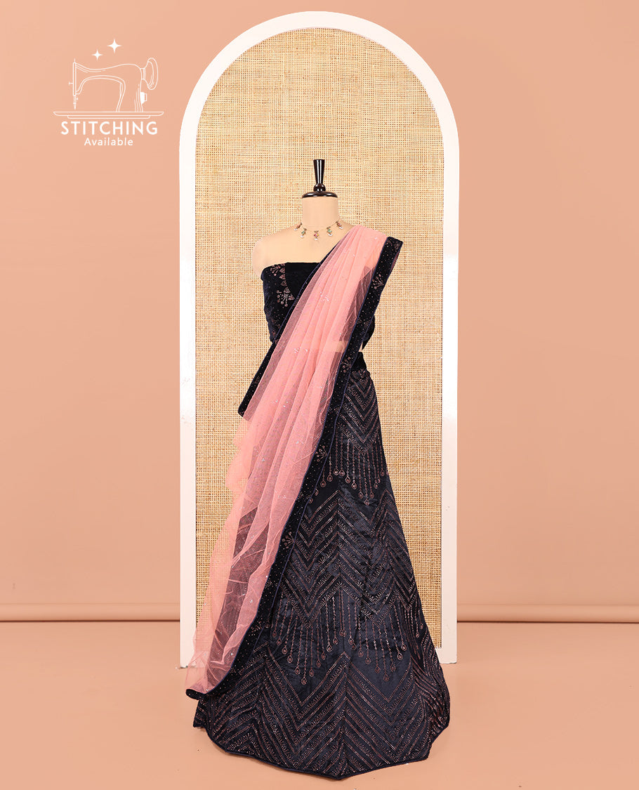 Pink Velvet Half-Saree, gleamed up with Swarovski Stonework Skirt, Matching Stonework Blouse, and Net Stonework Dhavani
