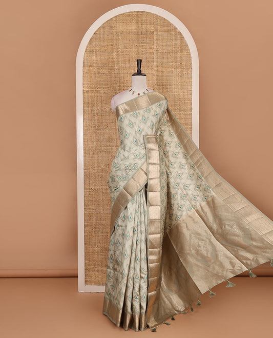 Pista green pochampally ikkat style motifs fancy tussar saree, traditional zari border, zari rich intricate pallu, and matching blouse