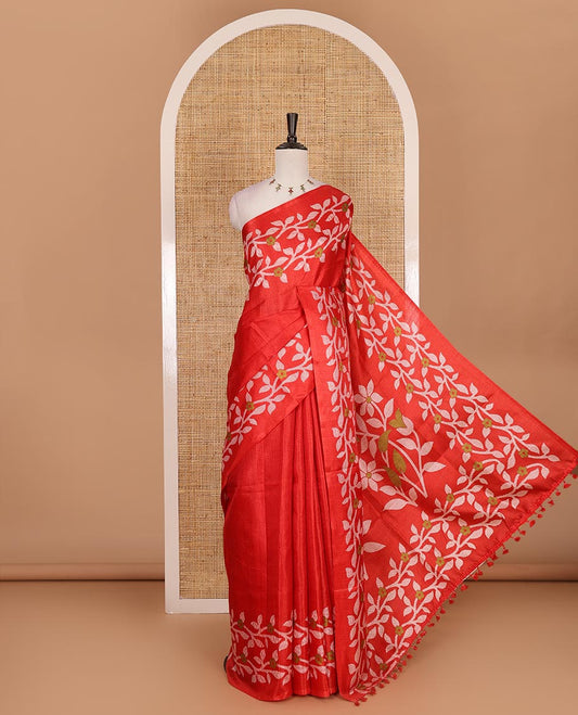 Red plain khadi cotton saree, floral creeper printed border, and pallu with small buttas printed blouse
