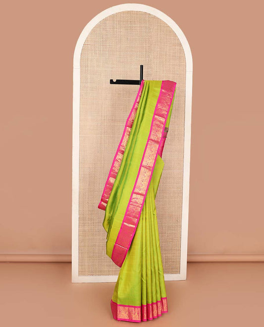 Green plain Kanchipuram korvai silk saree, contrast neer korvai border of thilakam mokku, kathir, poun, and mayil kann designs, and jaal pallu