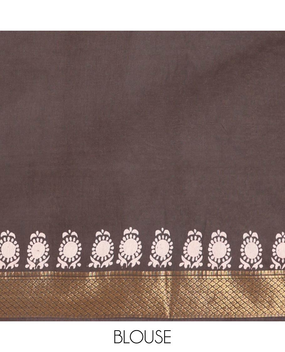 Pink batik printed Bhagalpuri cotton saree, contrast gold zari diamond-patterned border, printed pallu & pink blouse of print & zari work